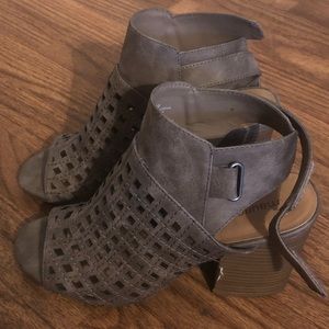 Grey peep toe heels with cutouts